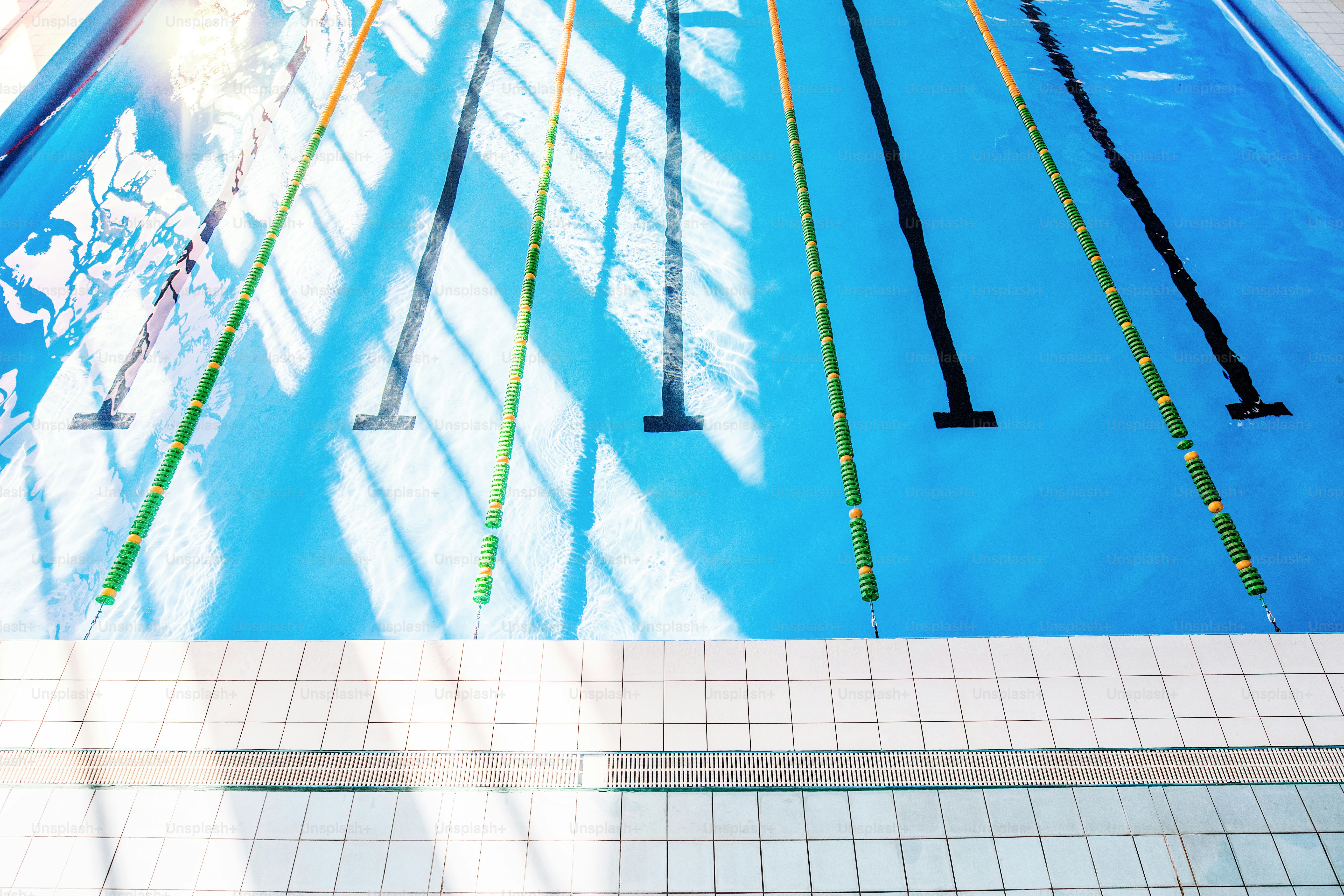 Lanes of an indoor public swimming pool. Top view. photo Water Image