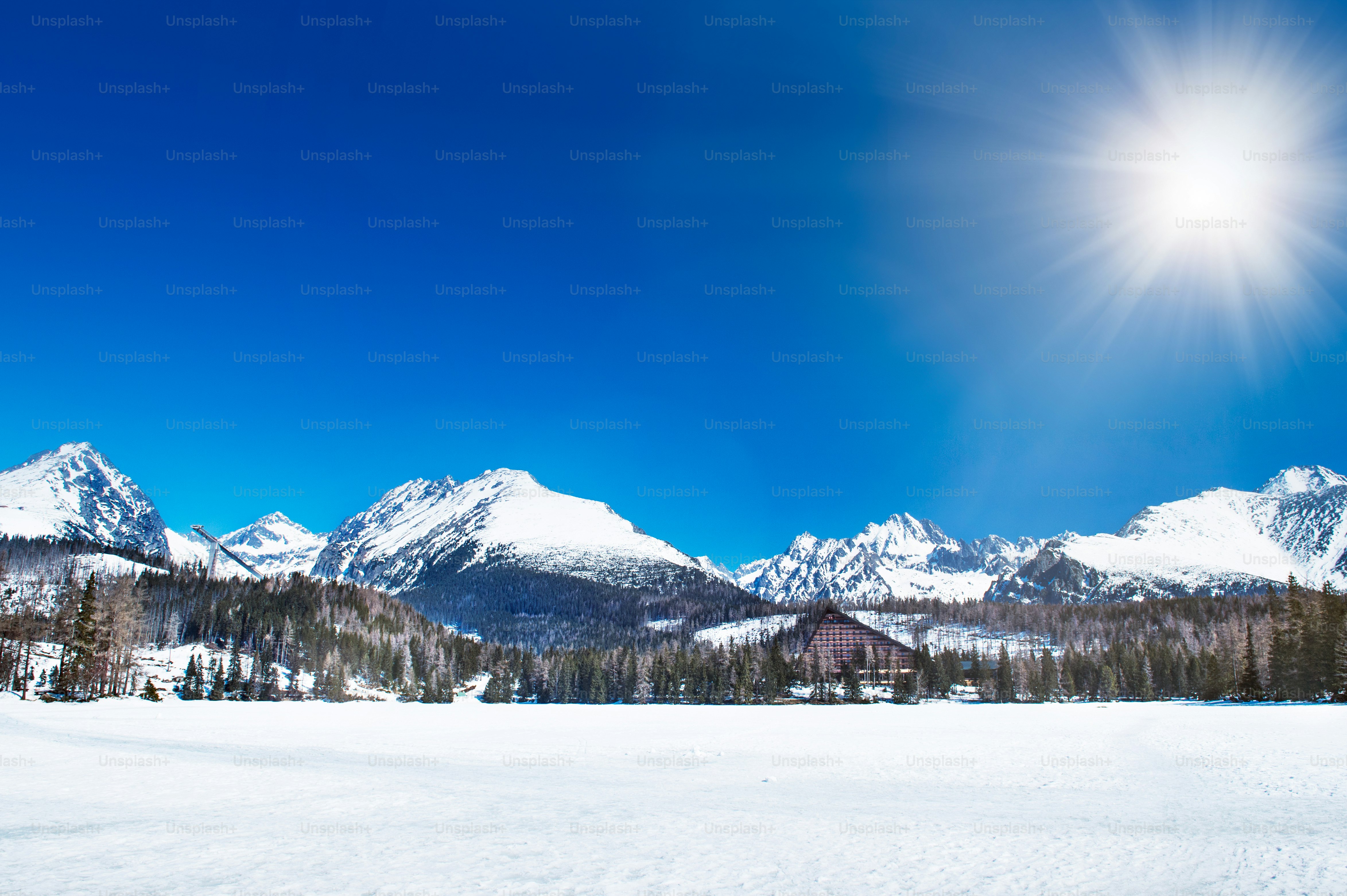 Beautiful winter mountain landscape with sun. High Tatras, Slovakia.