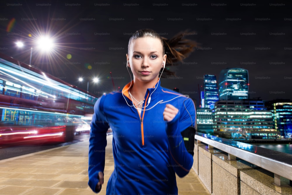 Young woman jogging outside in the city