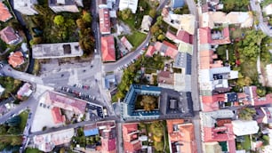 Aerial view of slovak town Banska Bystrica surrounded by green hills.