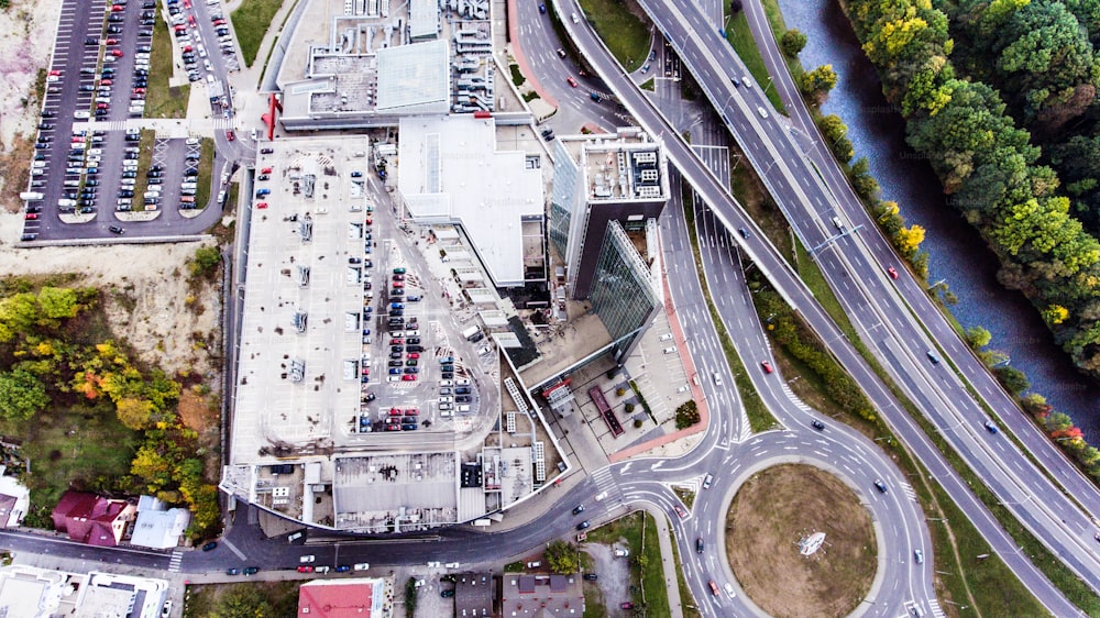 Aerial view, building, car park and highway passing through town. Banska Bystrica, Slovakia.