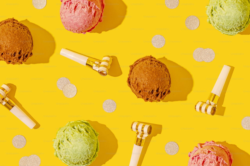 a yellow background with different colored ice creams