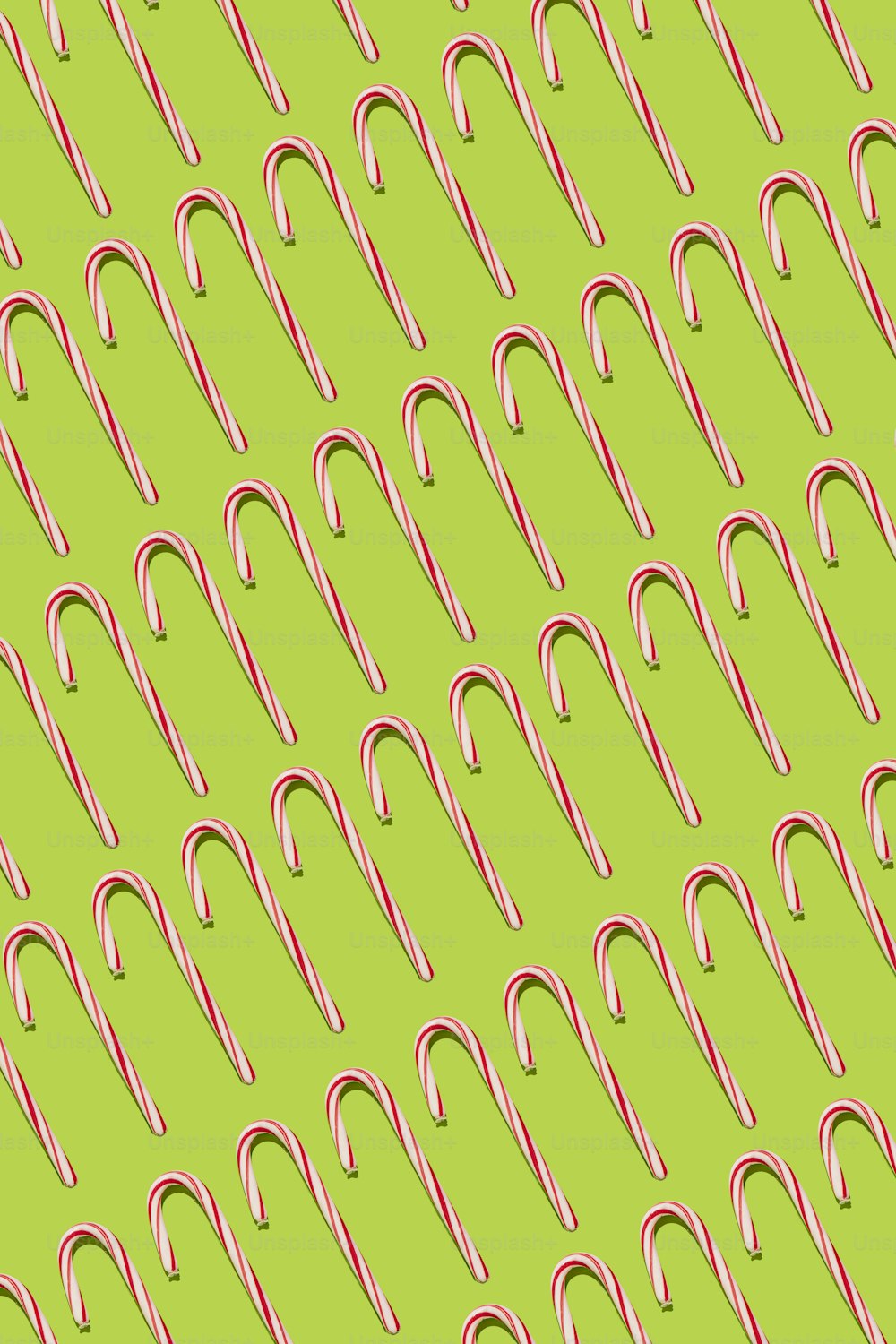a candy cane pattern on a green background
