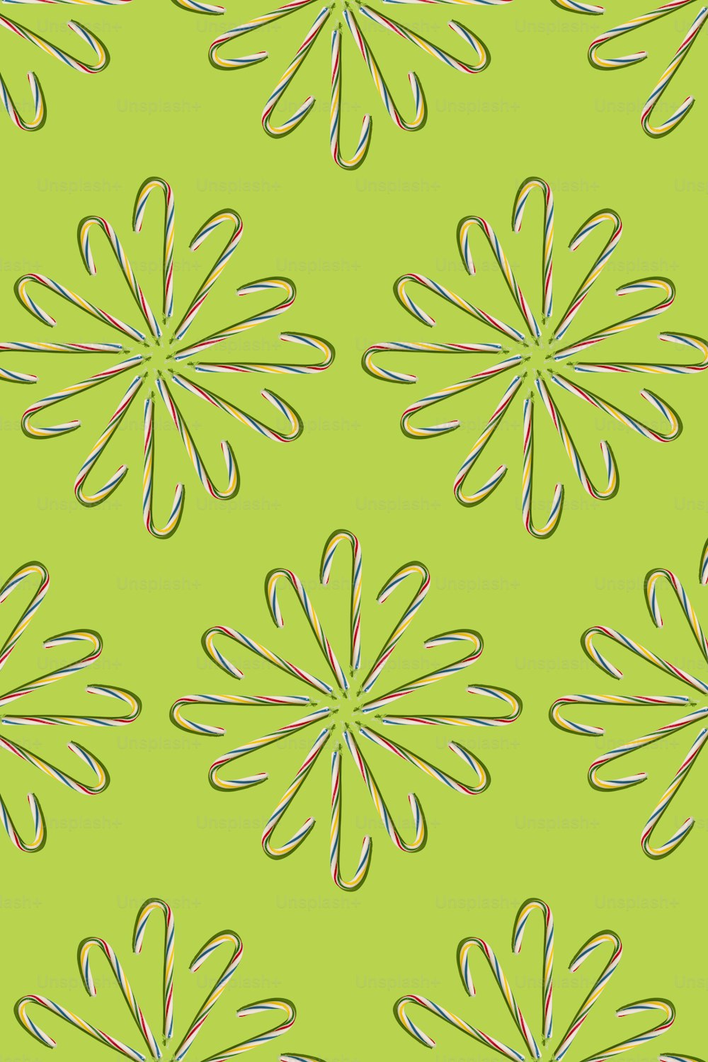 a green background with a flower design on it
