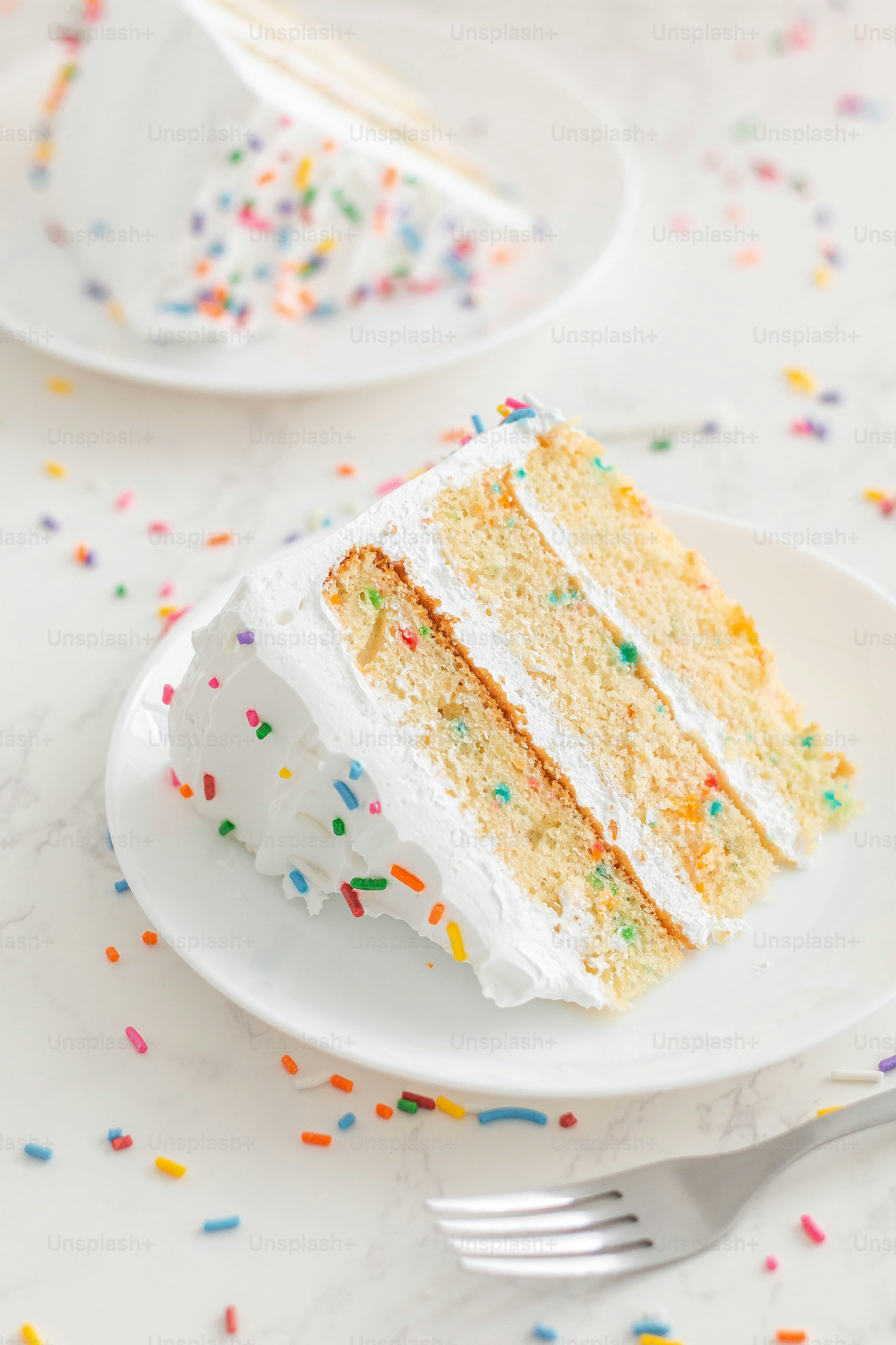 a slice of cake on a plate with a fork