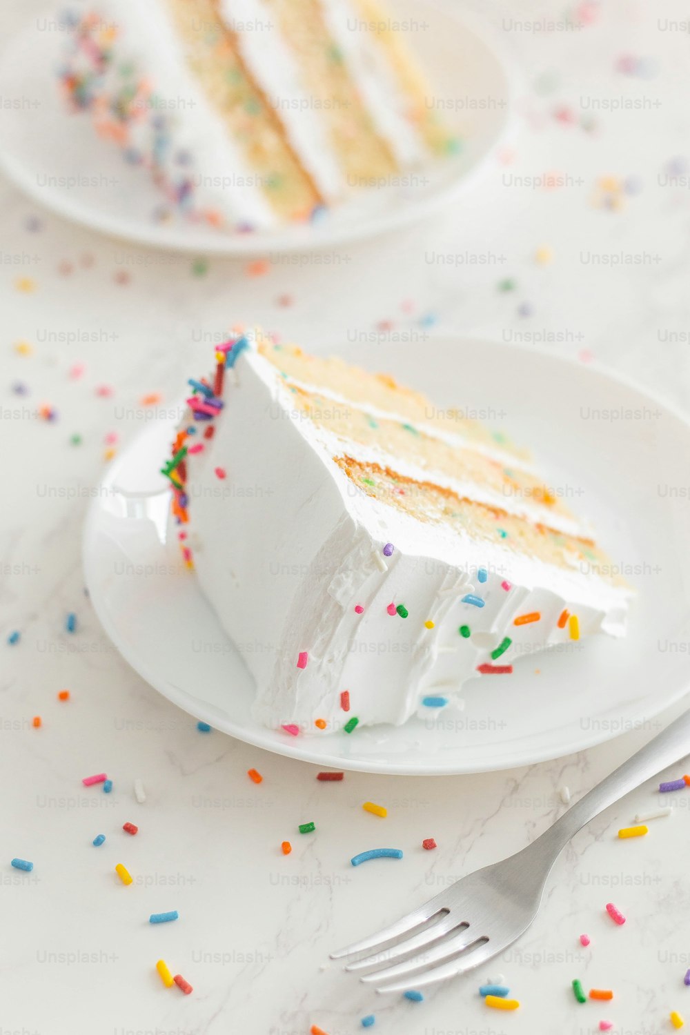 a slice of cake on a plate with a fork