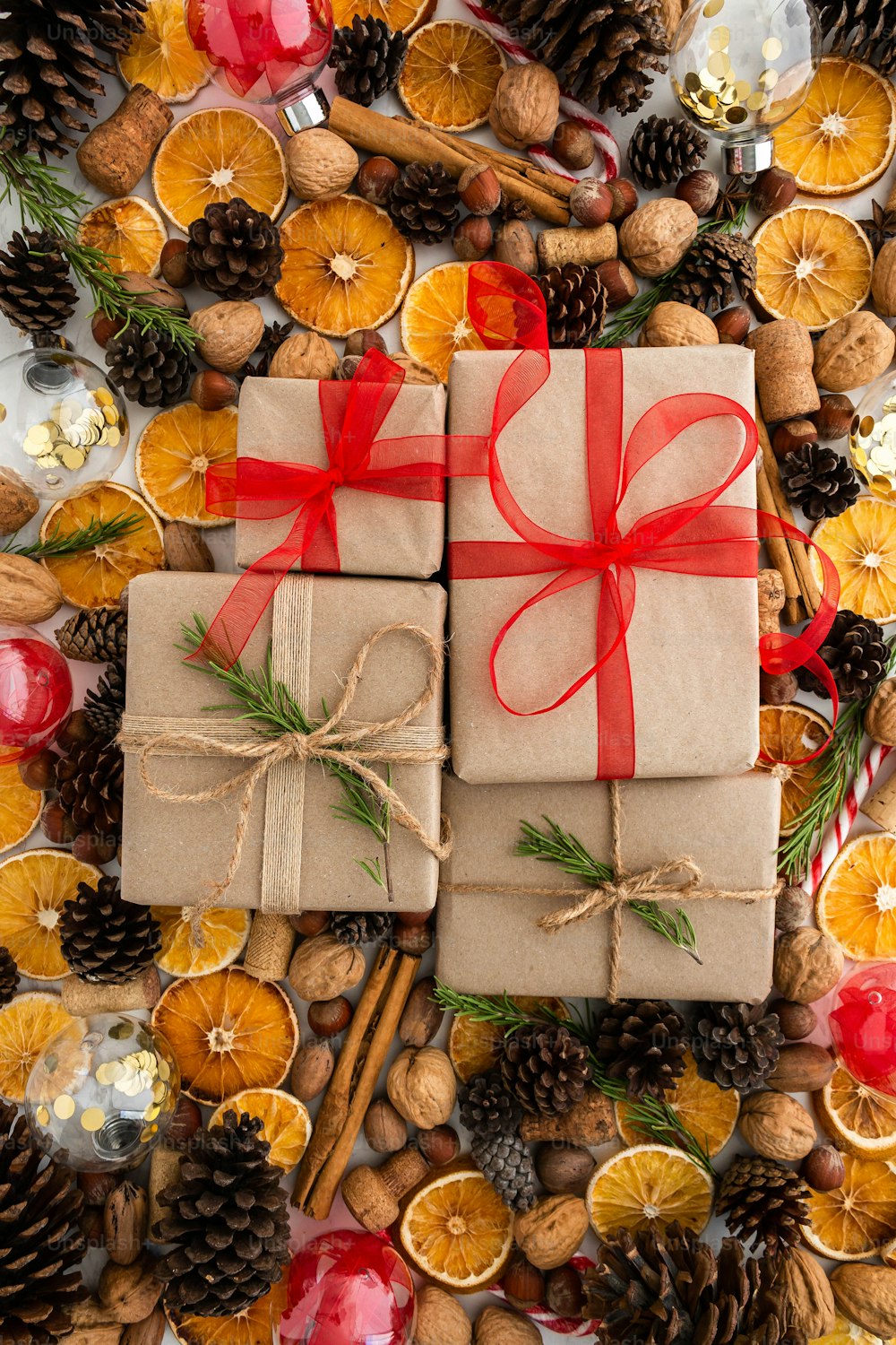 a gift wrapped in brown paper and tied with a red ribbon
