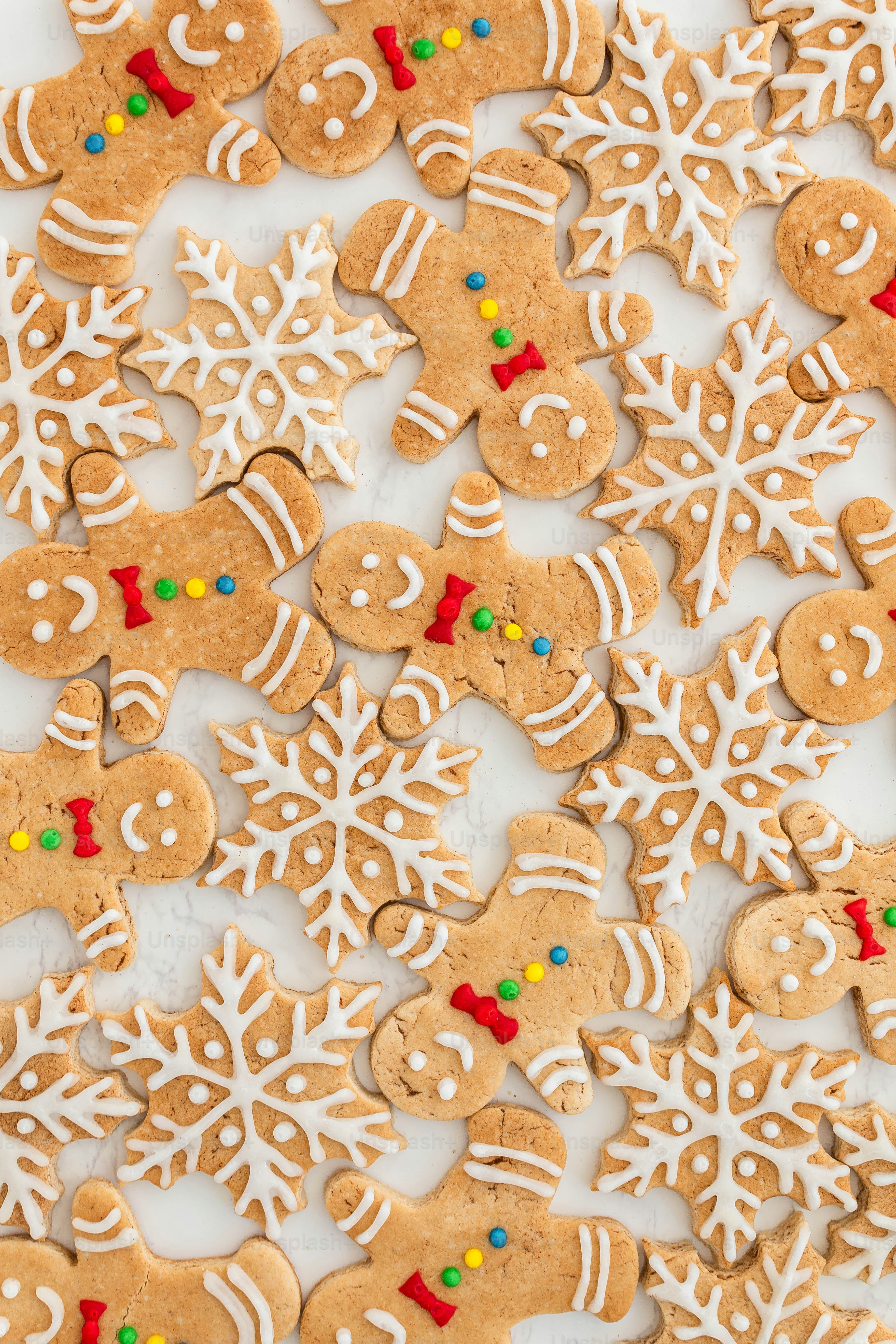 a table topped with lots of cut up cookies