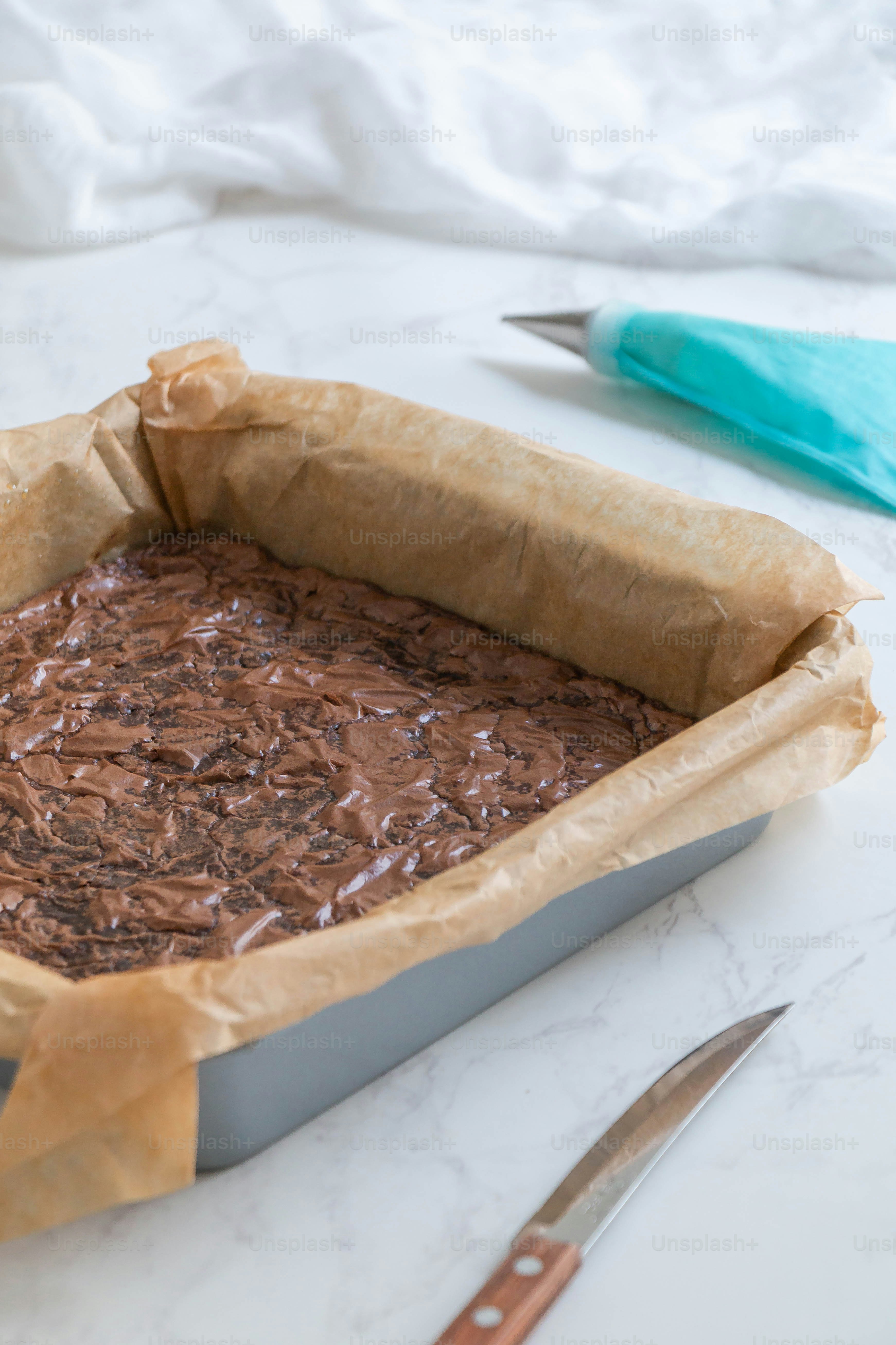 a pan of chocolate cake sitting on top of a table