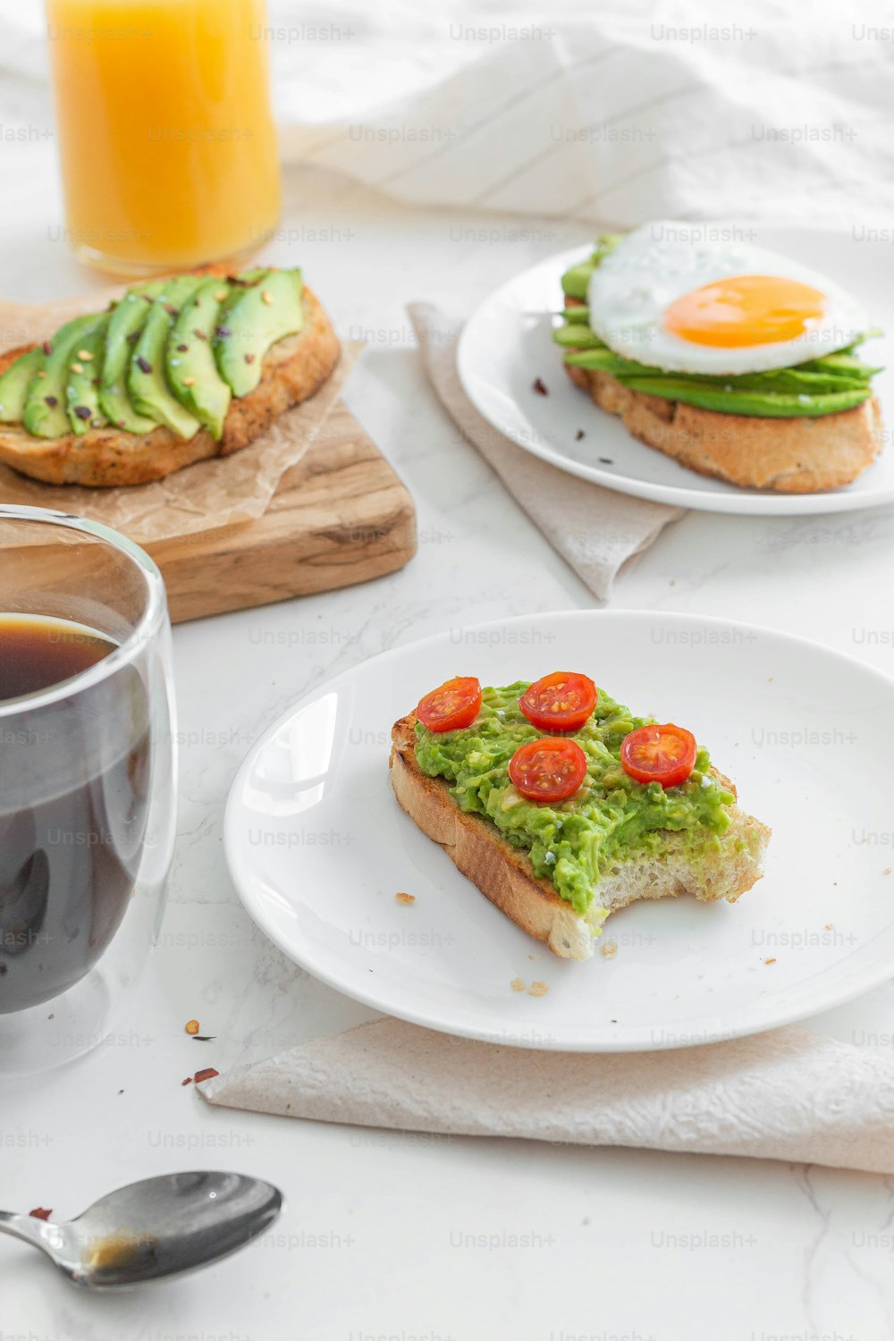 a plate of food and a cup of coffee on a table