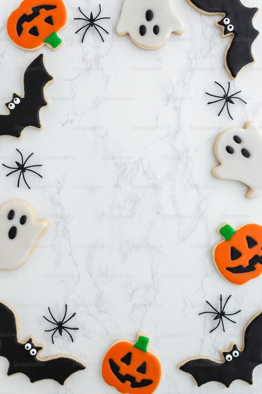 decorated halloween cookies arranged in a circle