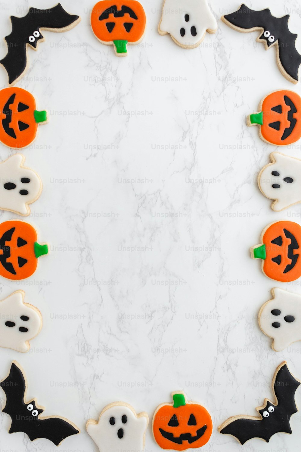 halloween cookies arranged in the shape of a circle