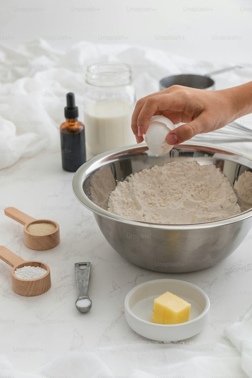 a person is mixing ingredients in a bowl