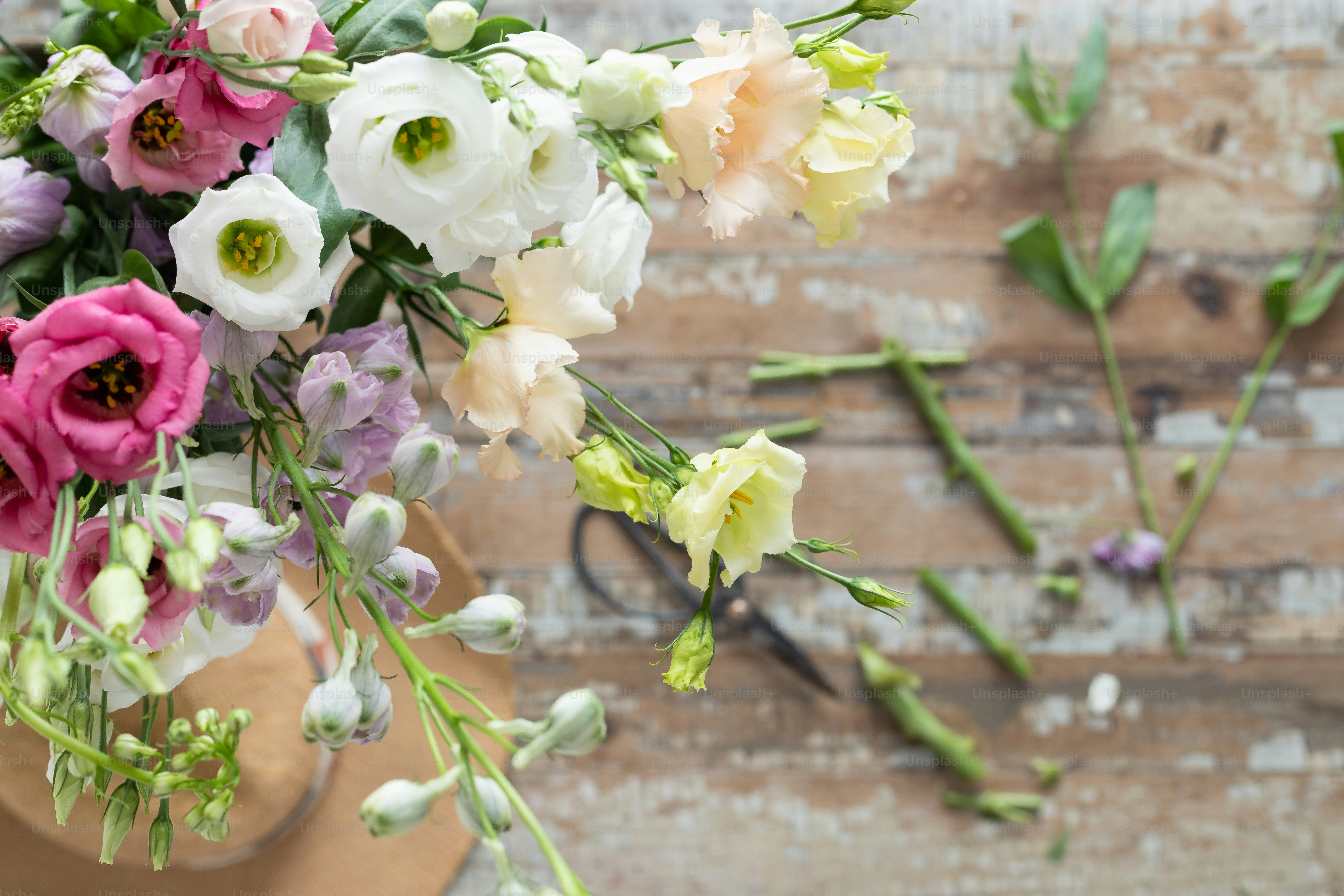 a bunch of flowers that are on a table