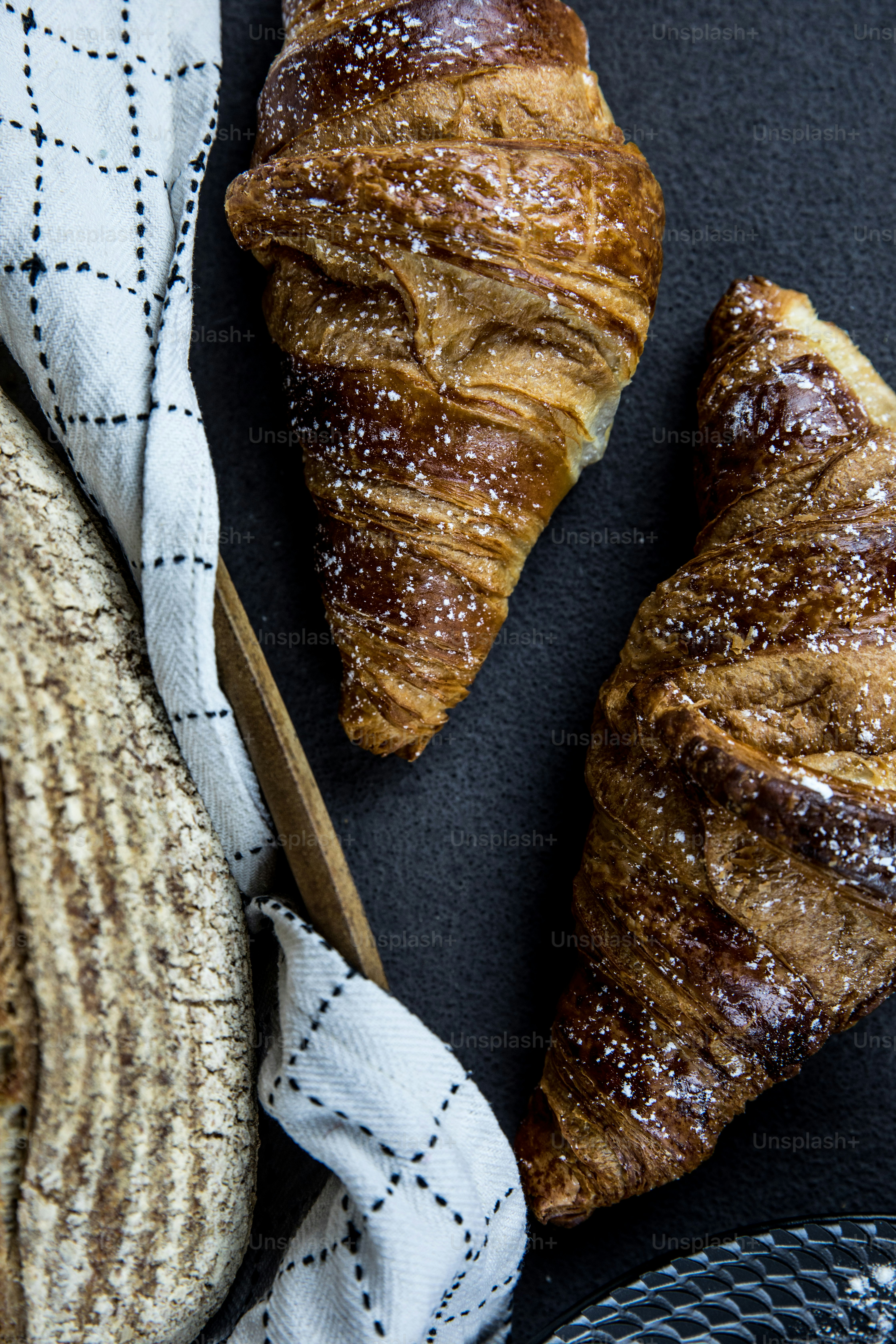 a couple of croissants sitting on top of a table