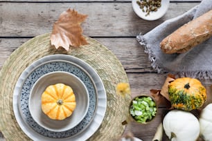 a table topped with plates and bowls filled with food