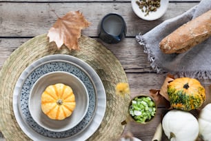 a table topped with plates and bowls filled with food