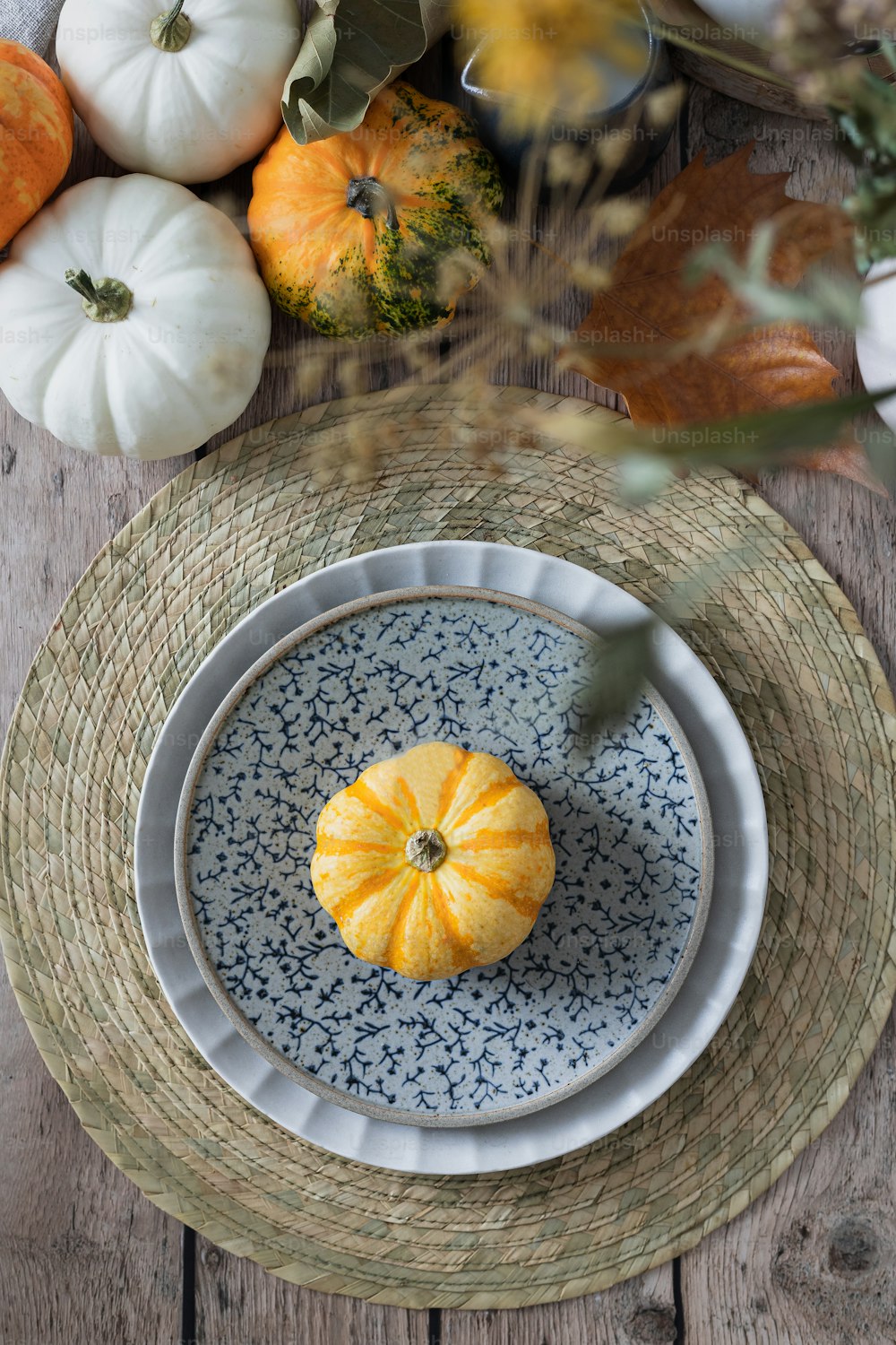 a plate that has a pumpkin on it