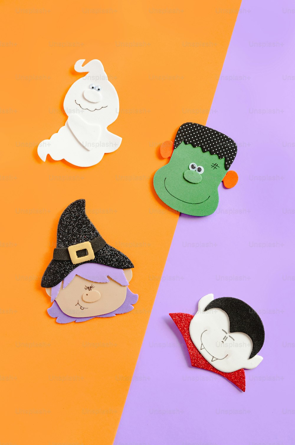 a group of paper cut outs of witches