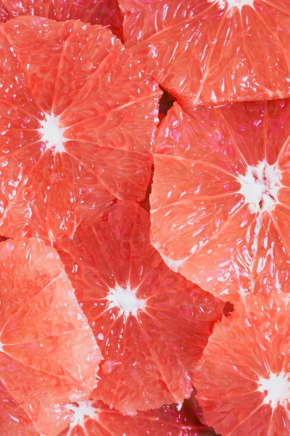 a close up of a bunch of grapefruits