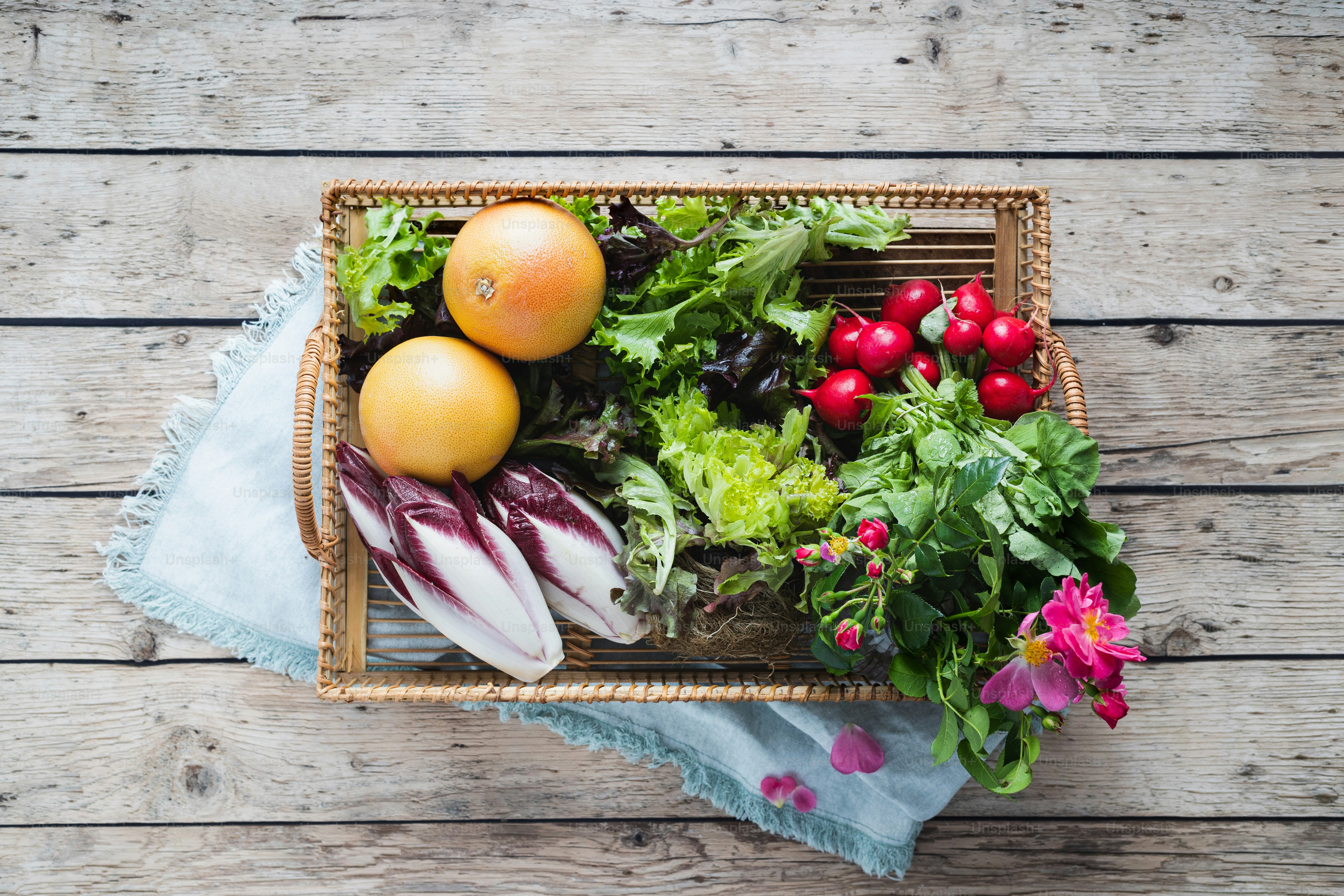 a basket filled with lots of different types of vegetables