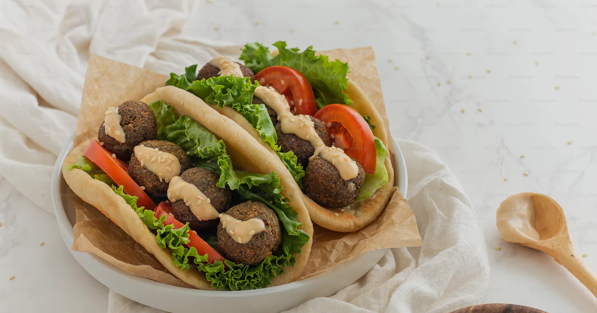 Meatball Splash A white bowl filled with two meatball sandwiches photo β Healthy Image ...