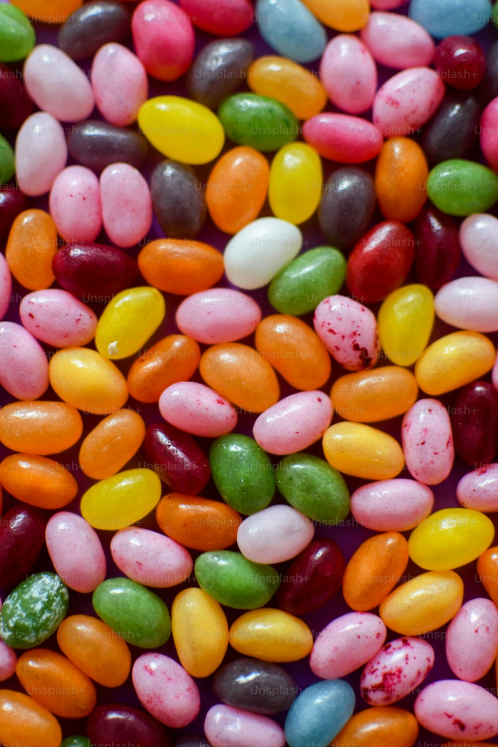 a close up of a bunch of candy beans