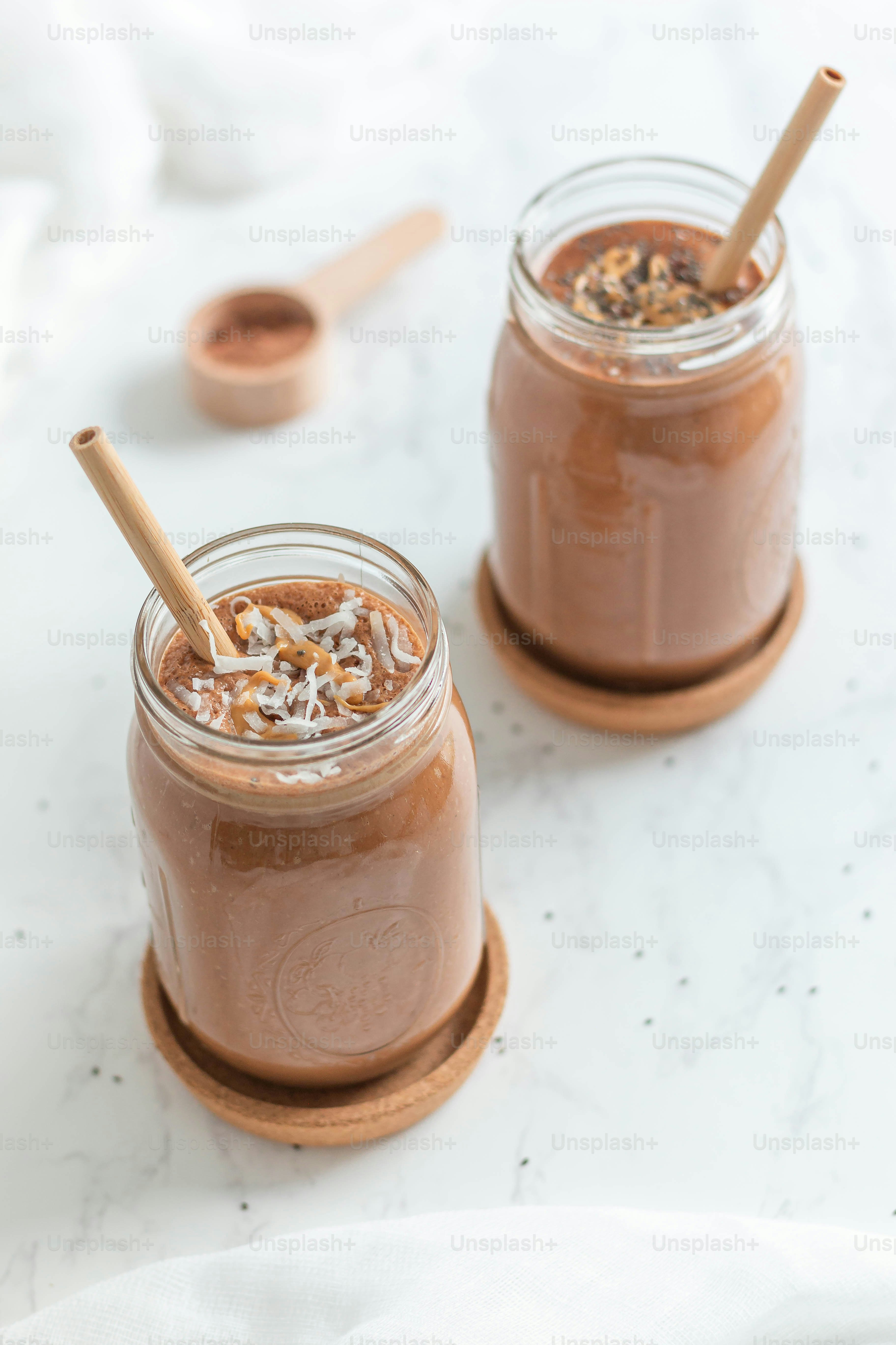 a couple of jars filled with food on top of a table