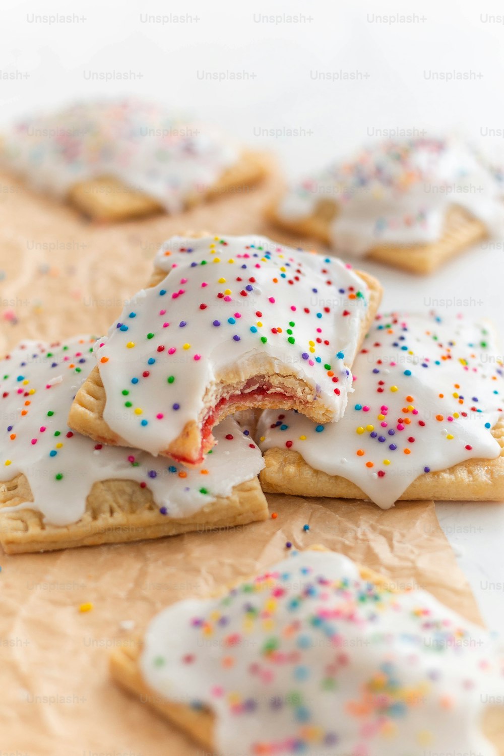 a close up of a bunch of cookies with sprinkles