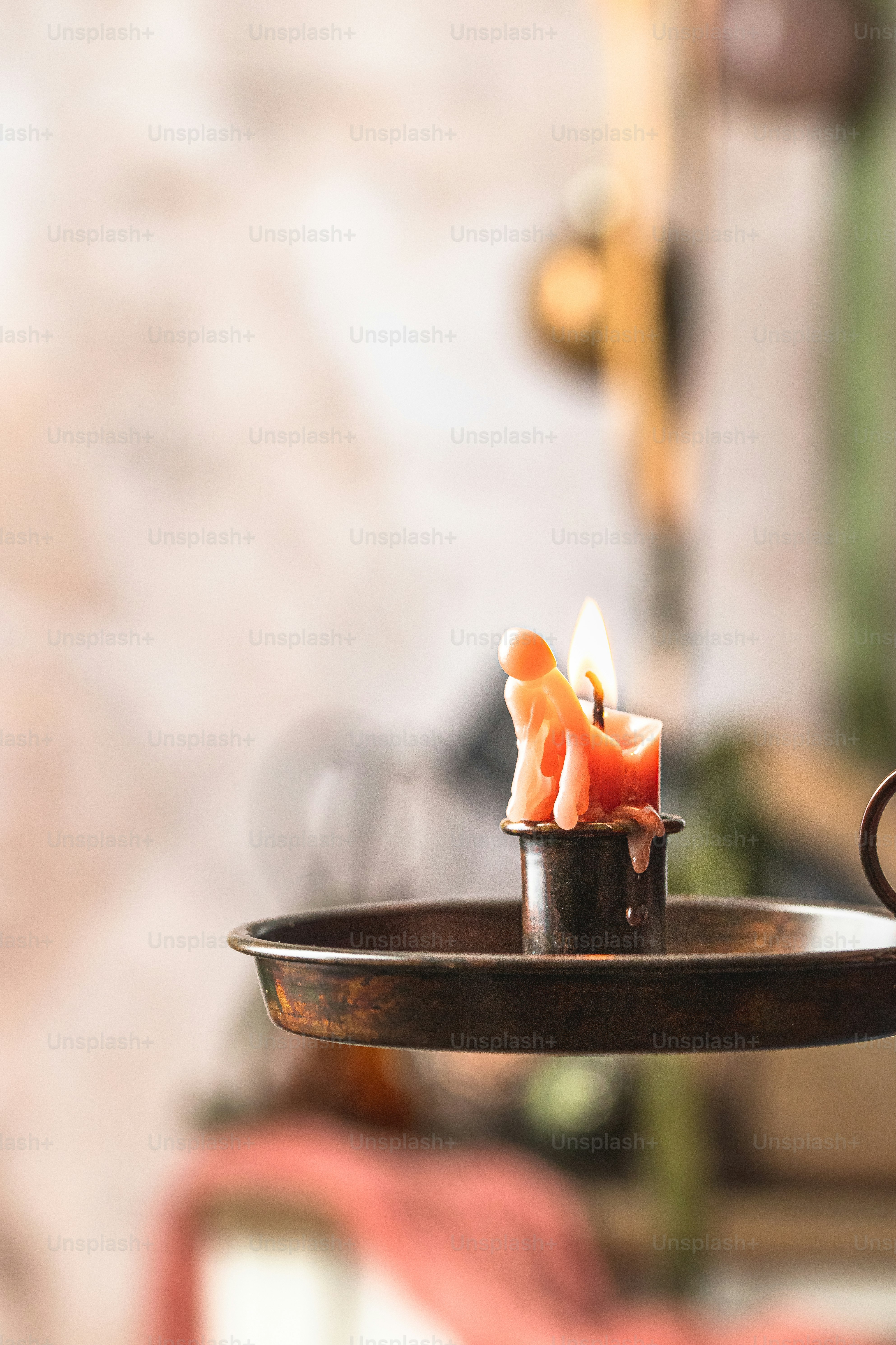 a candle that is sitting on a tray