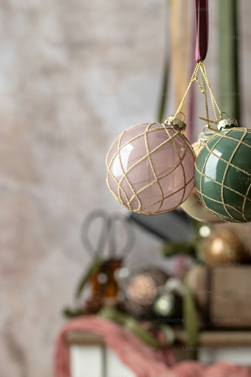 a couple of ornaments hanging from a wire