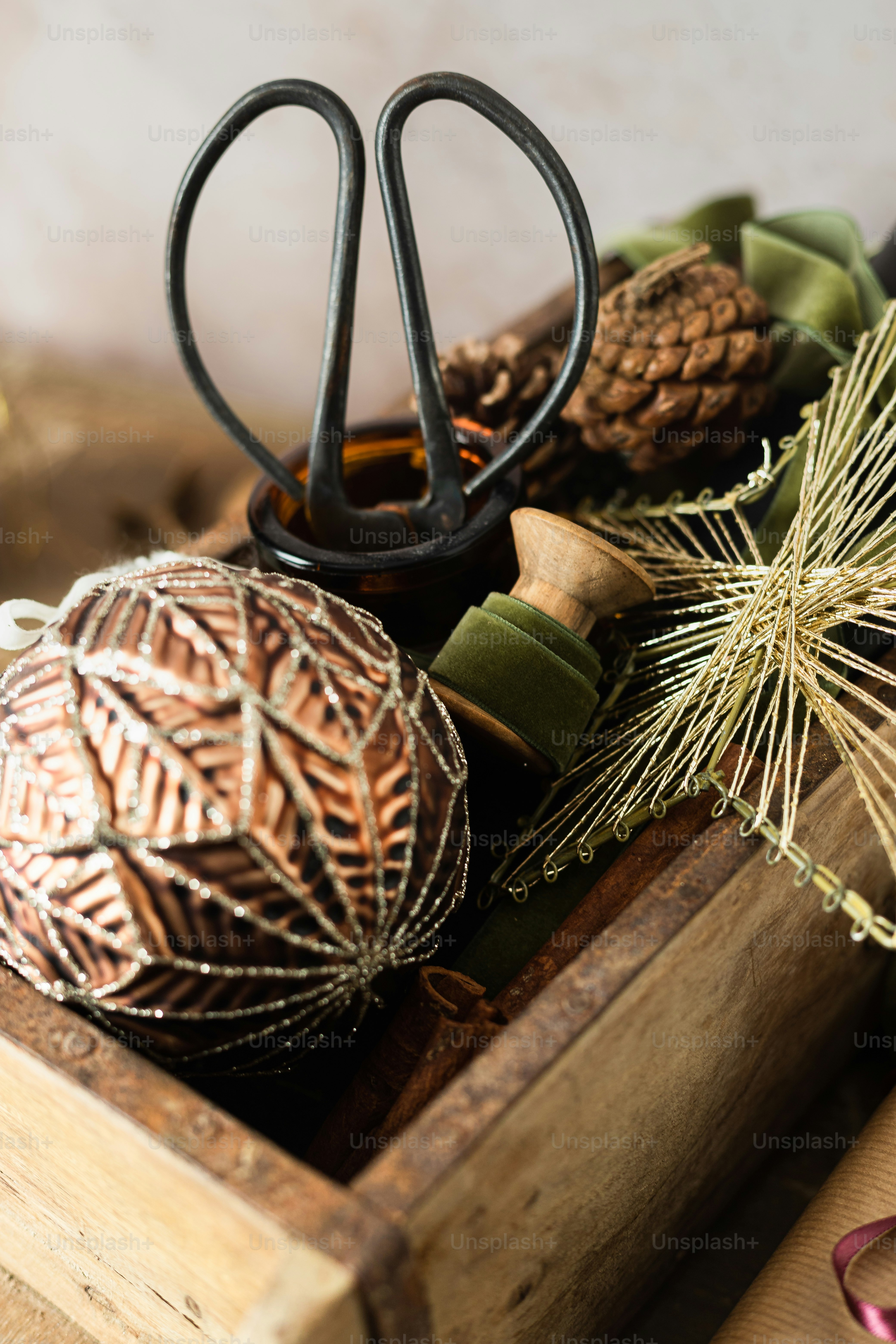 a close up of a wooden box with ornaments