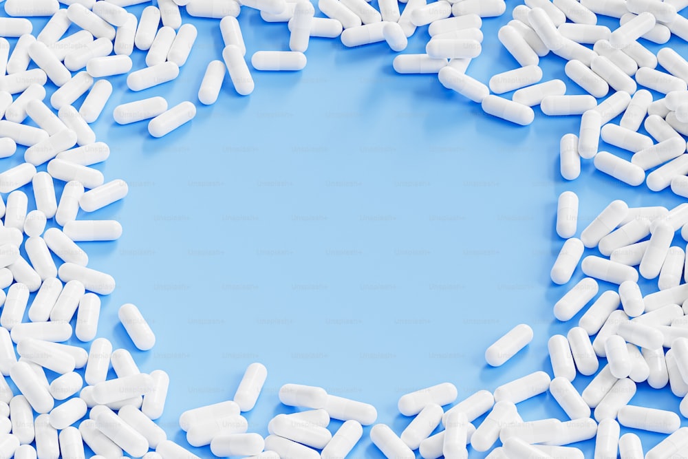 a circle of white pills on a blue background