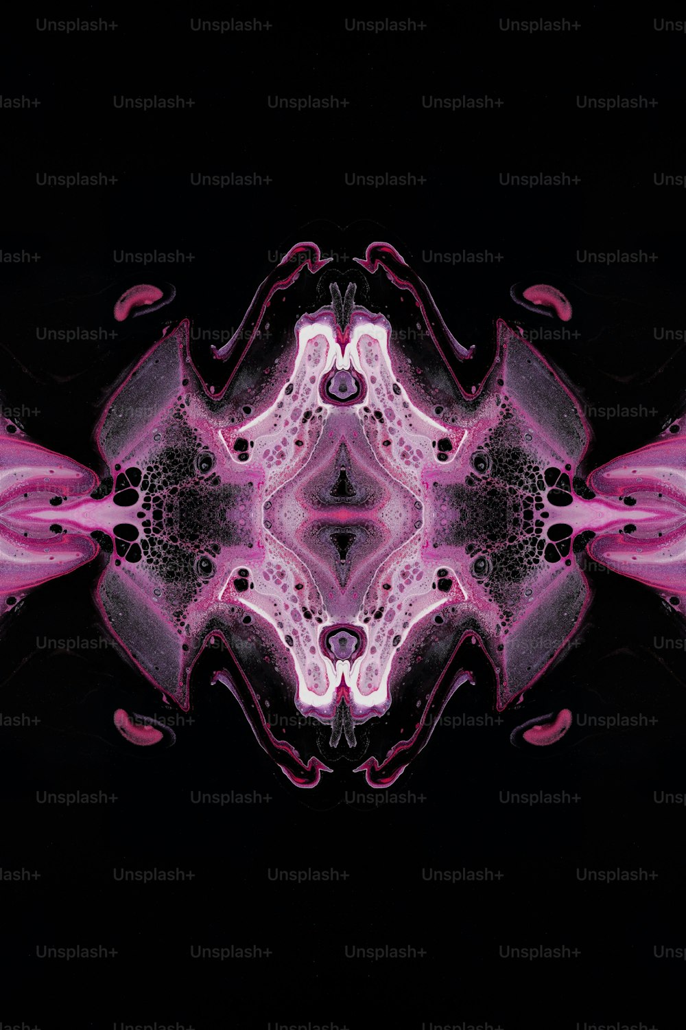 a black background with a pink and black design