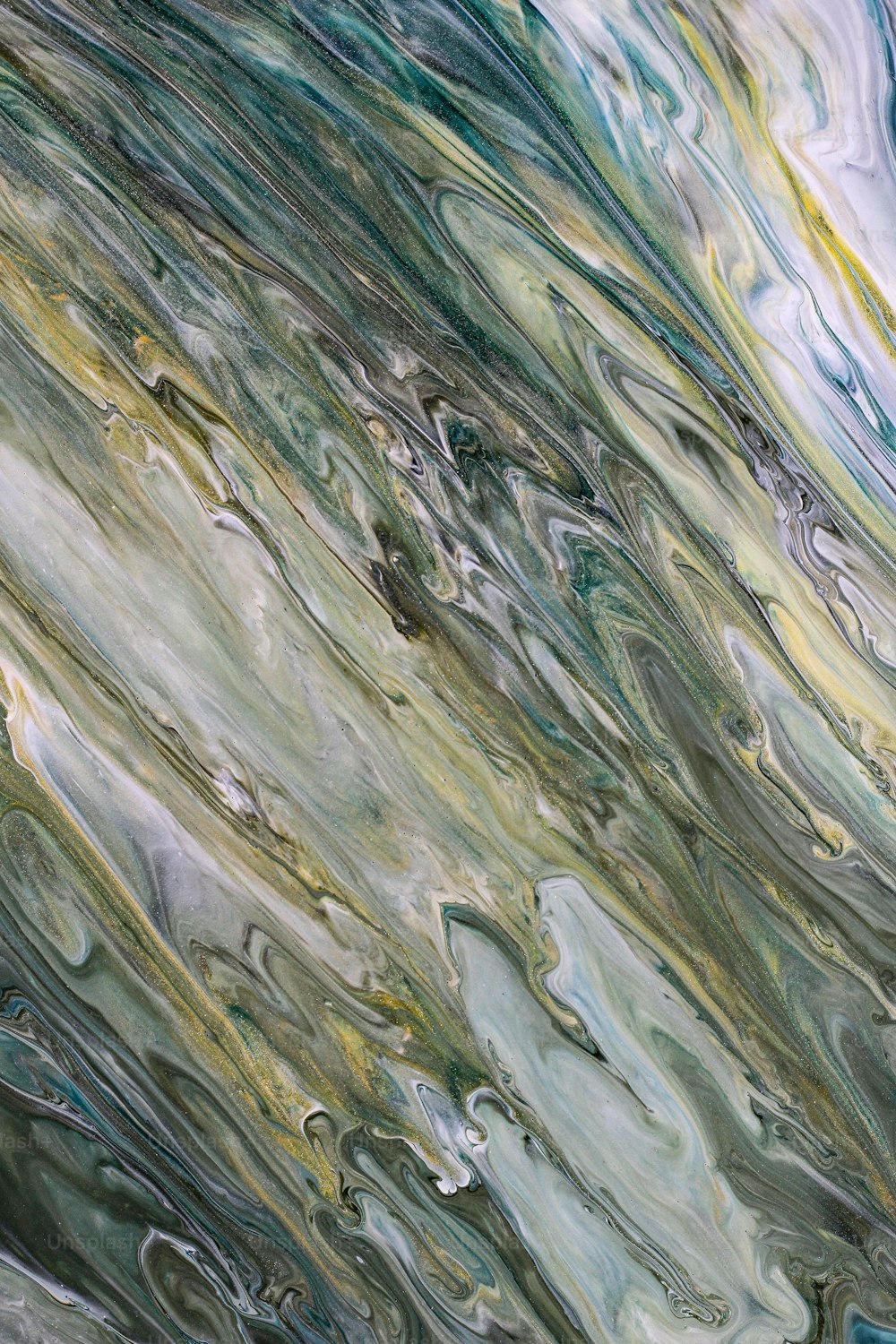 an abstract painting of blue, green, yellow and white colors