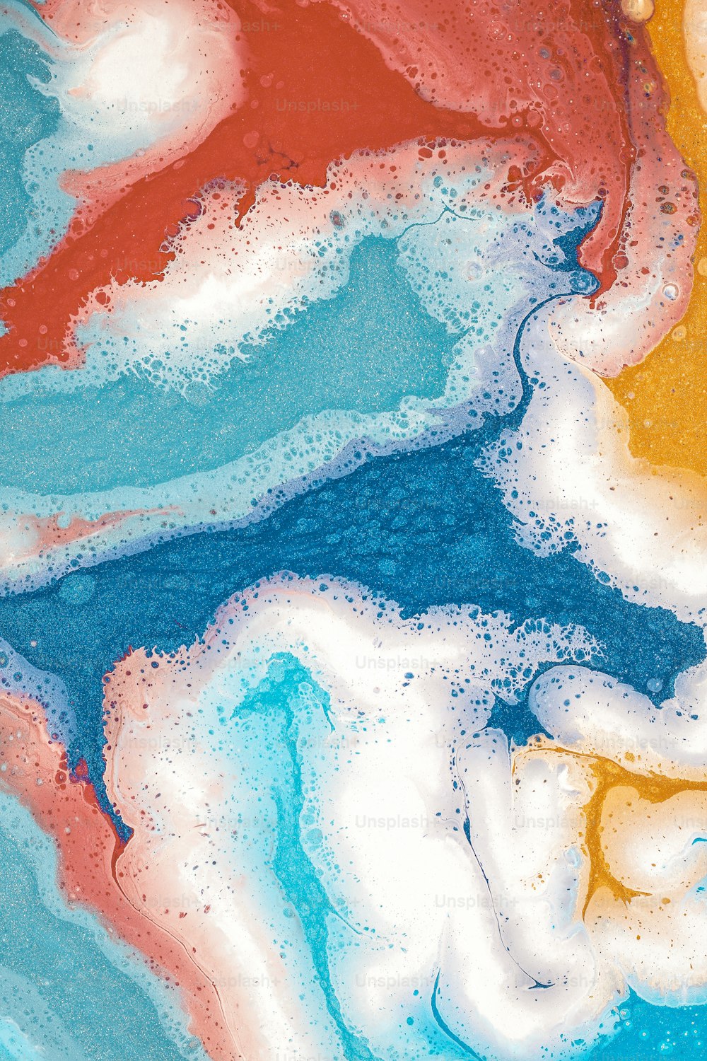 a close up of a colorful liquid substance