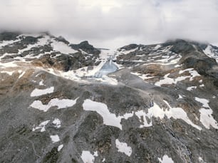 a view of a mountain with snow on it