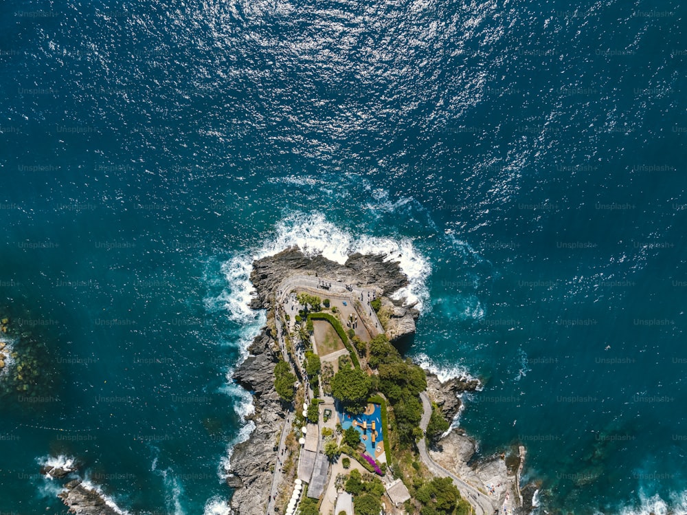 an aerial view of an island in the middle of the ocean