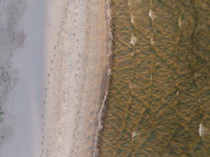 a bird's eye view of a sandy beach