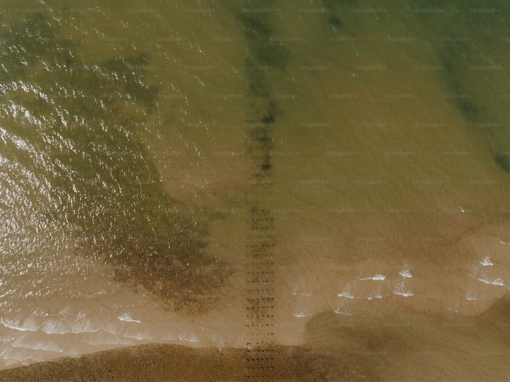 a bird's eye view of a sandy beach
