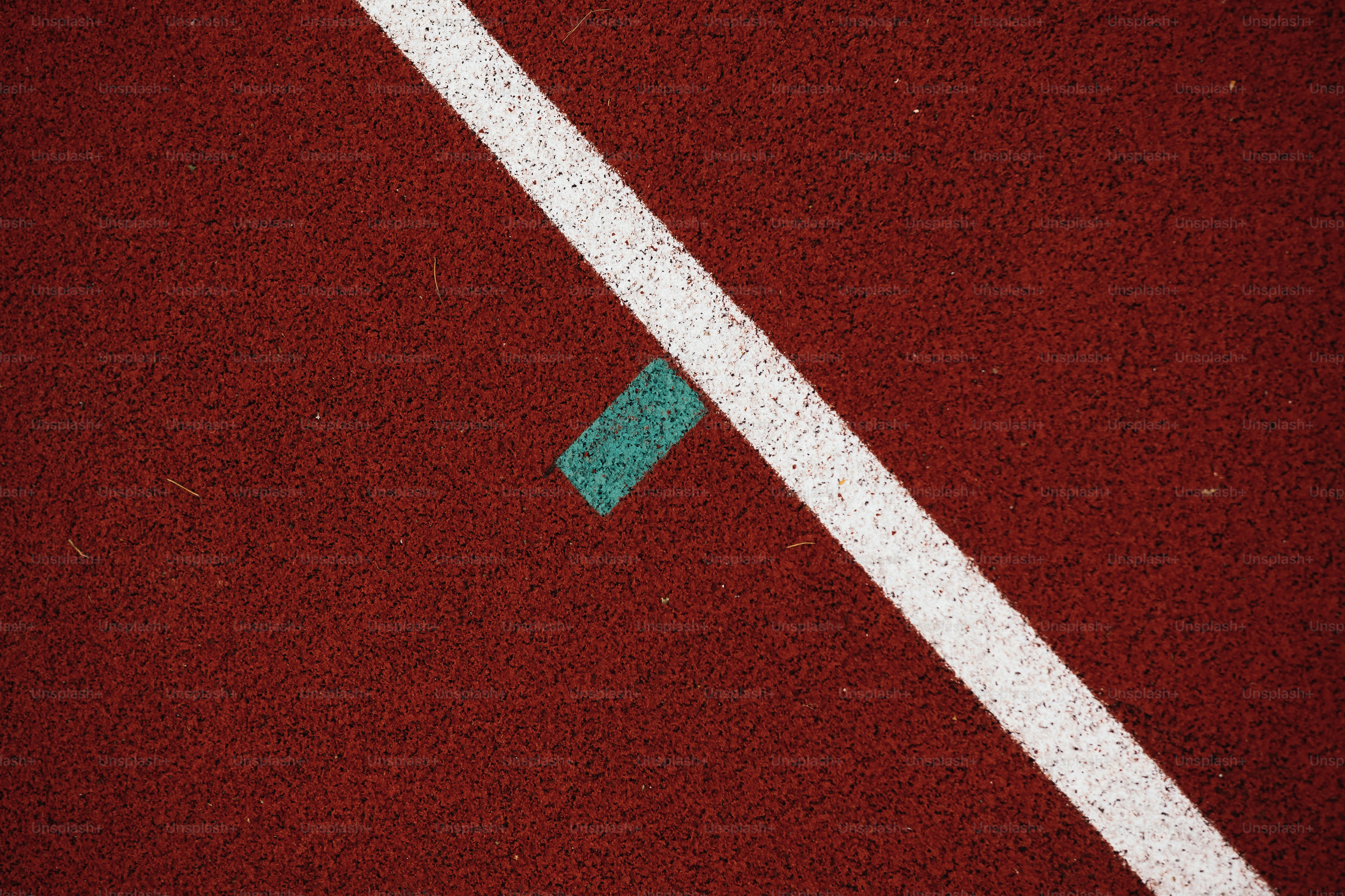a tennis court with a blue and white line on it