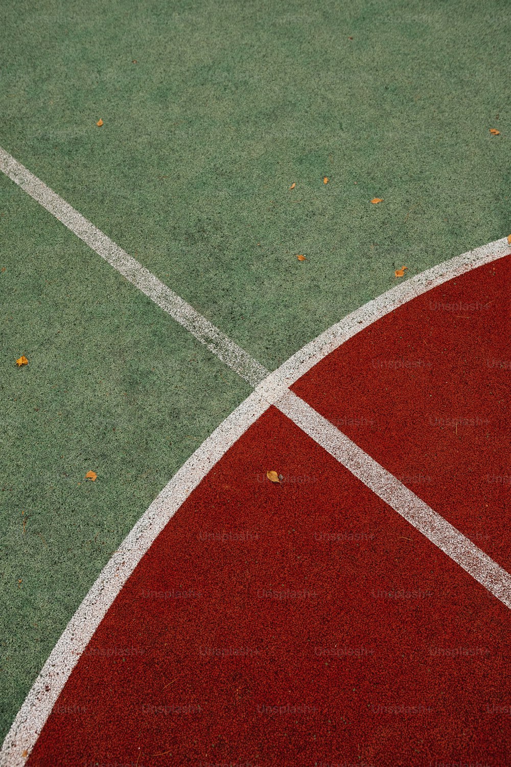 a close up of a tennis court with a tennis racket