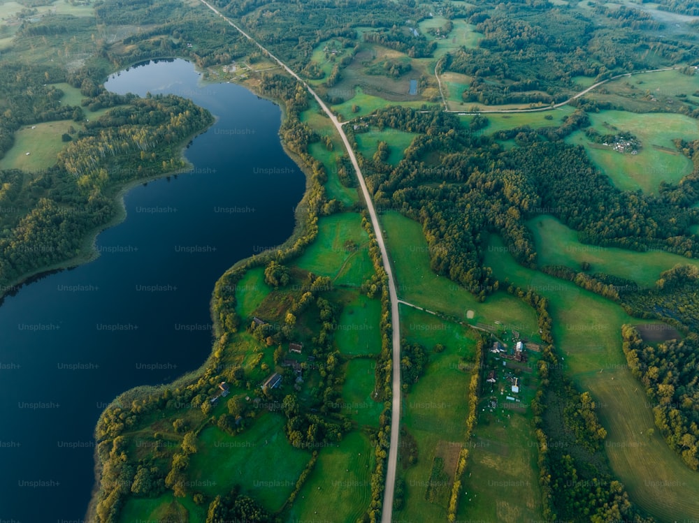 an aerial view of a golf course and a river