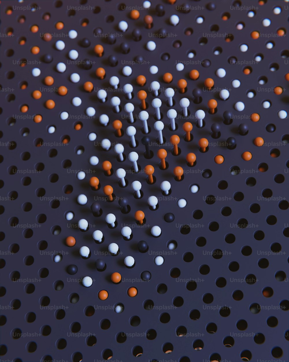 a bunch of white and orange dots on a blue surface