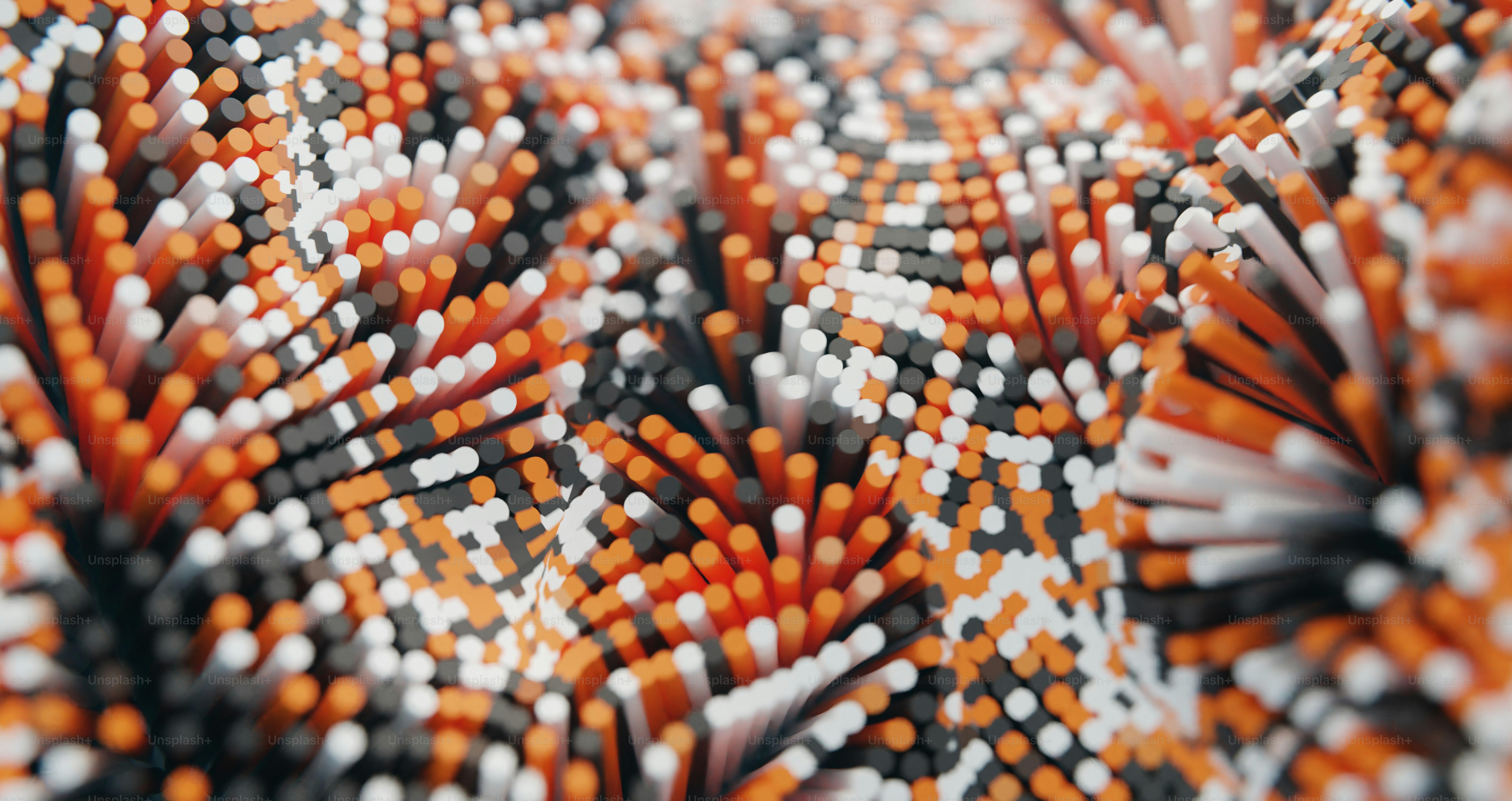 a close up of a bunch of orange and white objects