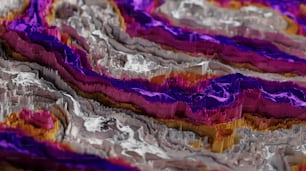 Eine Nahaufnahme einer violetten und silbernen Oberfläche