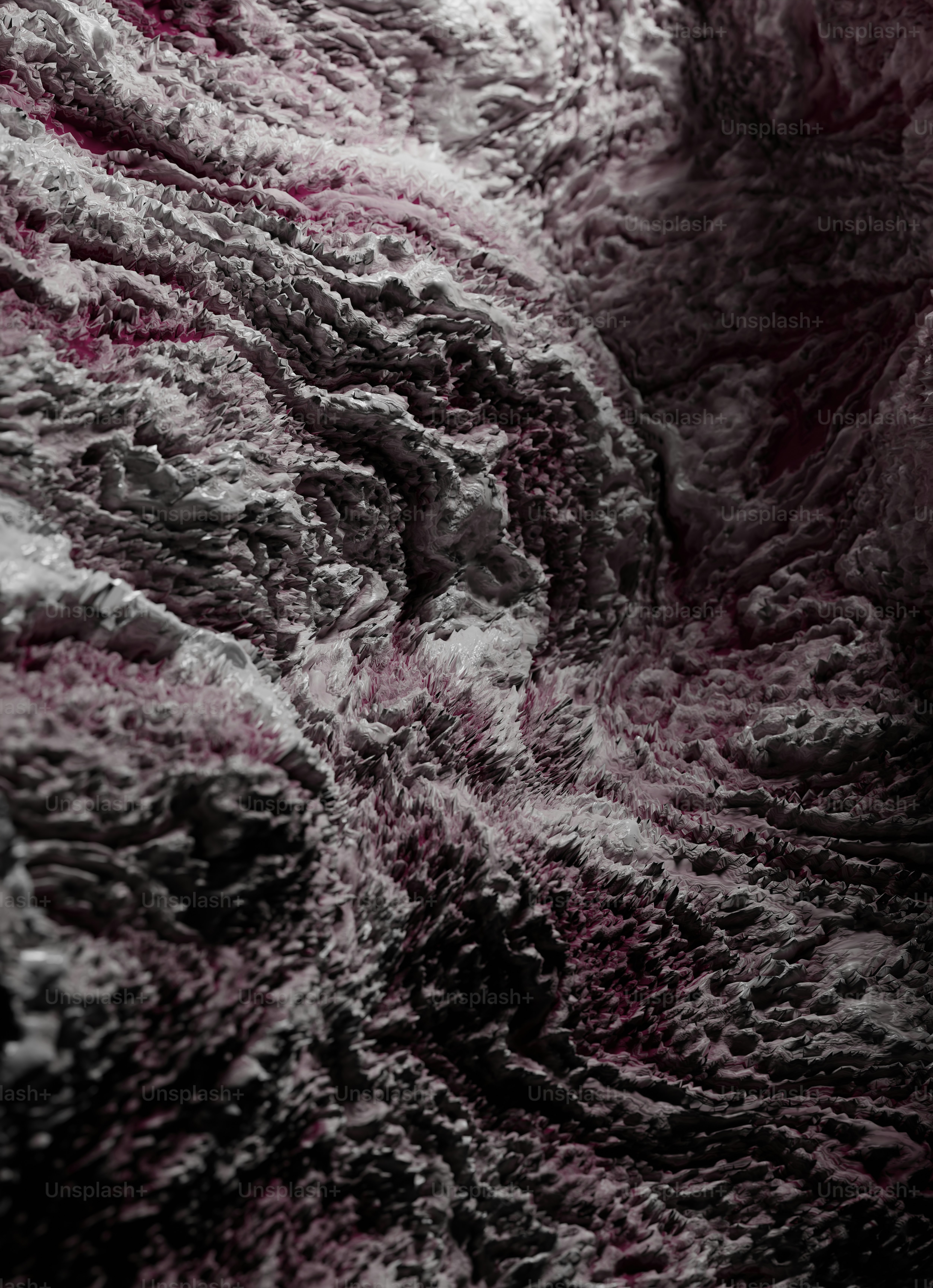 uma foto em preto e branco de uma cama com um edredom rosa