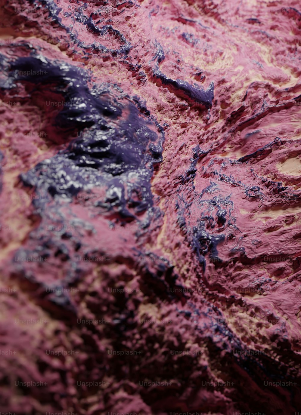 a close up of a rock with a purple substance on it