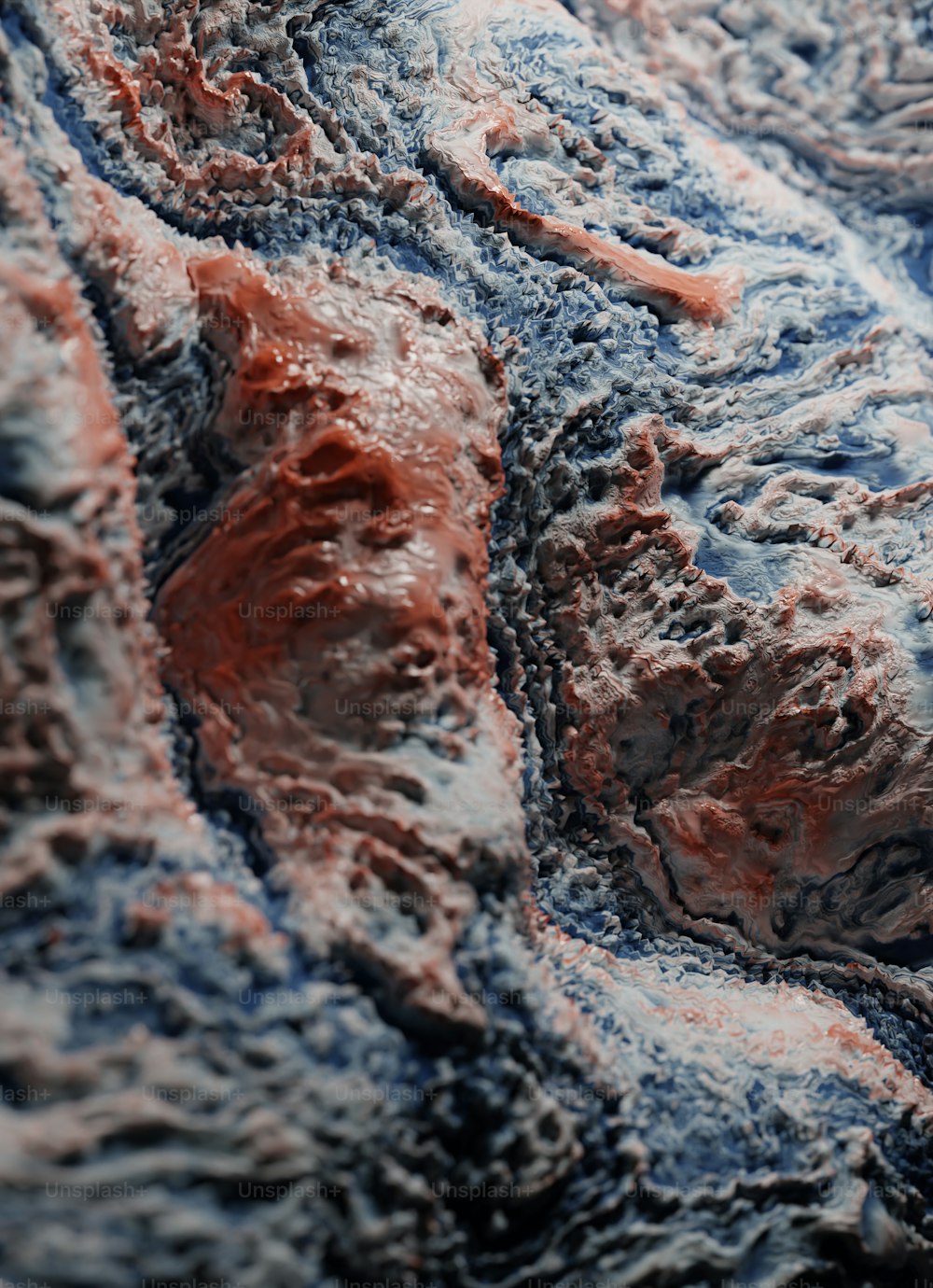 a close up of a red and blue substance