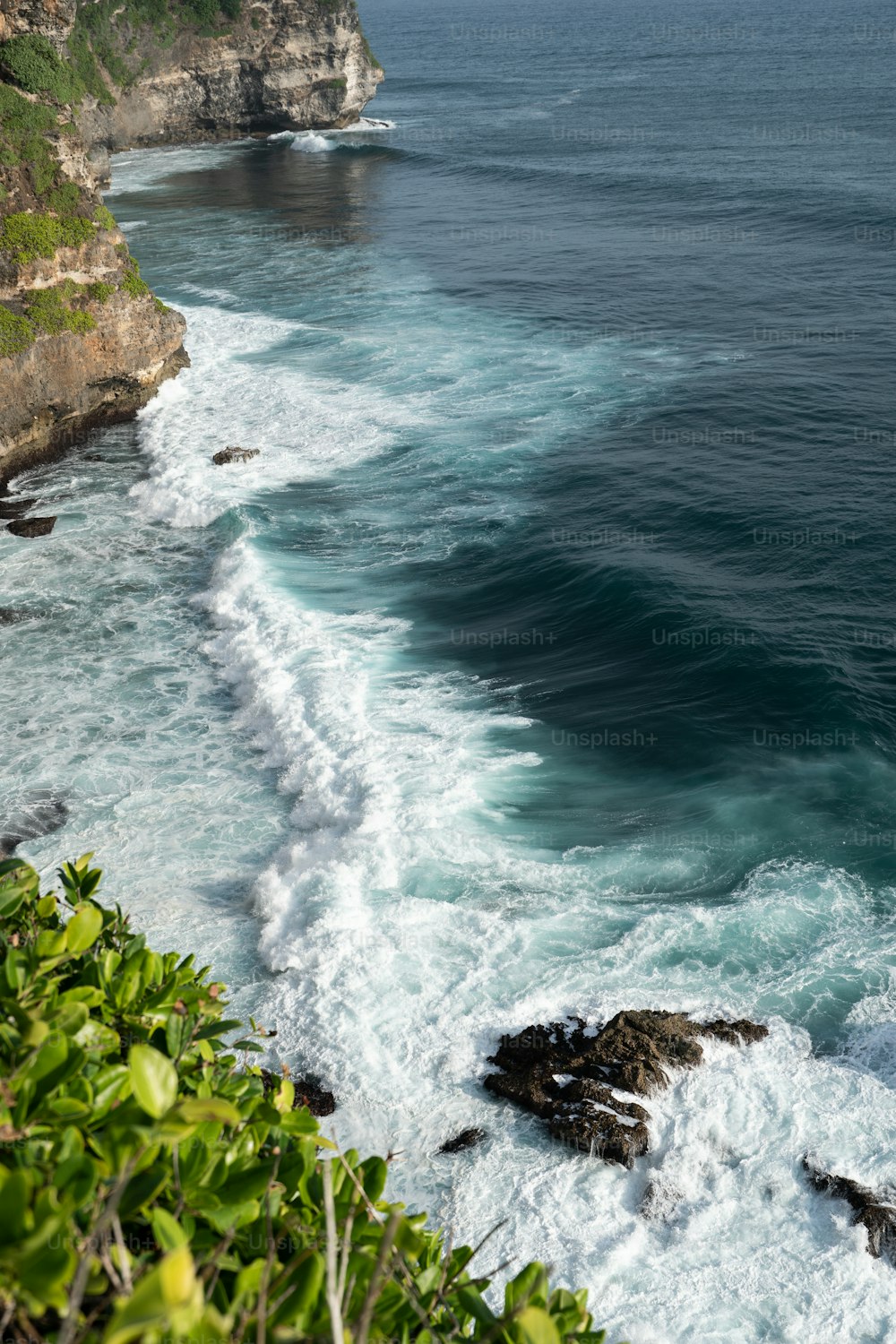a view of the ocean from a cliff